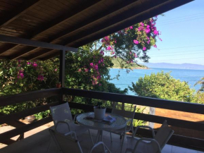 Quartos em casa Frente Mar